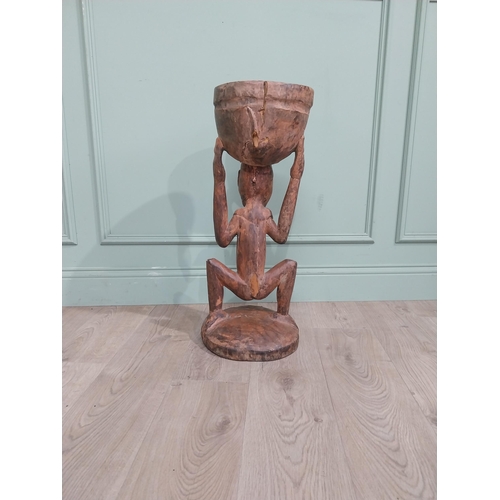 410 - Antique African hardwood figure. {70 cm H x 25 cm W x 28 cm D}.