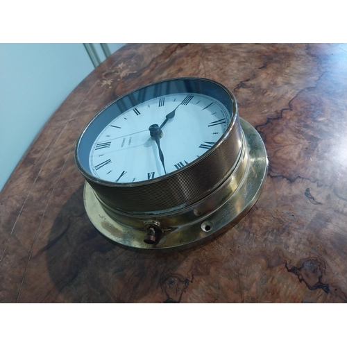 413 - Quartz wall clock. {22 cm Dia.}.