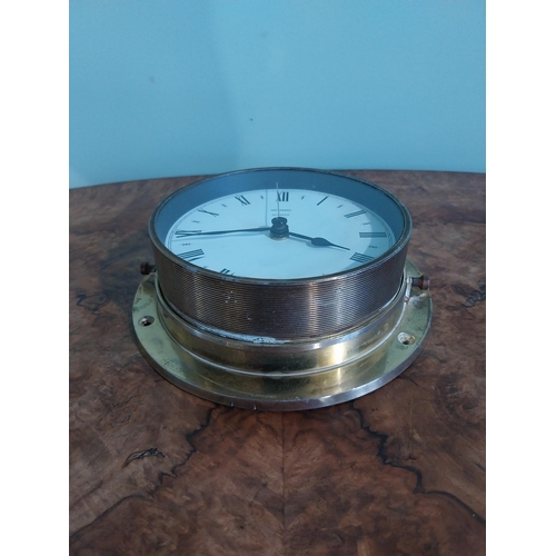 413 - Quartz wall clock. {22 cm Dia.}.