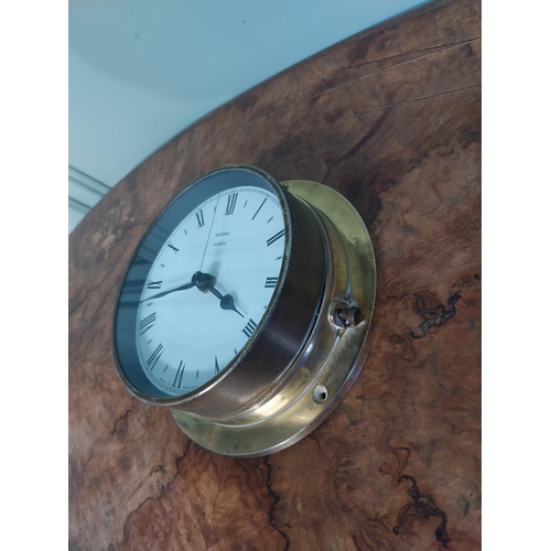 413 - Quartz wall clock. {22 cm Dia.}.