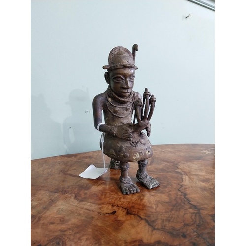 415 - African Benin bronze sculpture. {20 cm H x 9 cm W x 10 cm D}.