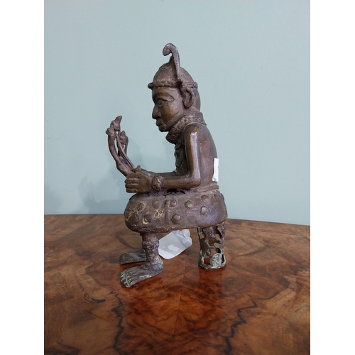 415 - African Benin bronze sculpture. {20 cm H x 9 cm W x 10 cm D}.