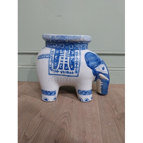 416 - Oriental blue and white garden stool in the form of an Elephant. {36 cm H x 44 cm W x 22 cm D].