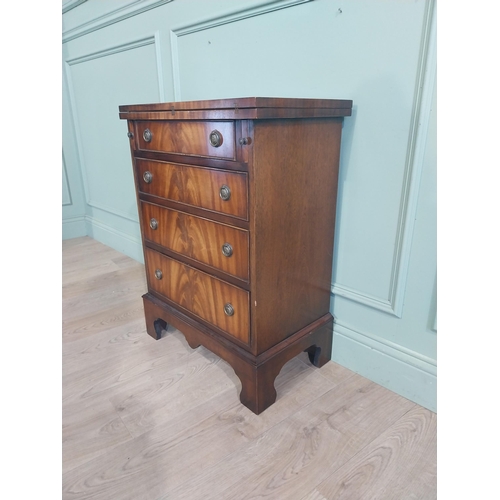 418 - Mahogany chest of drawers with two short drawers over three long drawers raised on shaped bracket fe... 