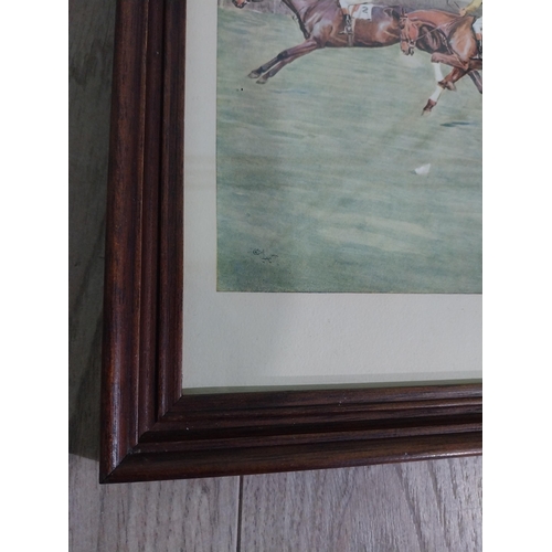 422 - Four Edwardian Grand National coloured prints mounted in oak frames. {24 cm H x 37 cm W}.