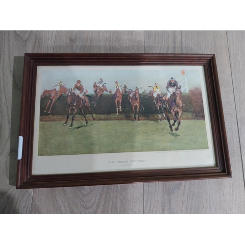 422 - Four Edwardian Grand National coloured prints mounted in oak frames. {24 cm H x 37 cm W}.