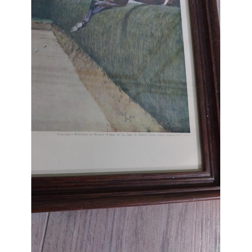 422 - Four Edwardian Grand National coloured prints mounted in oak frames. {24 cm H x 37 cm W}.