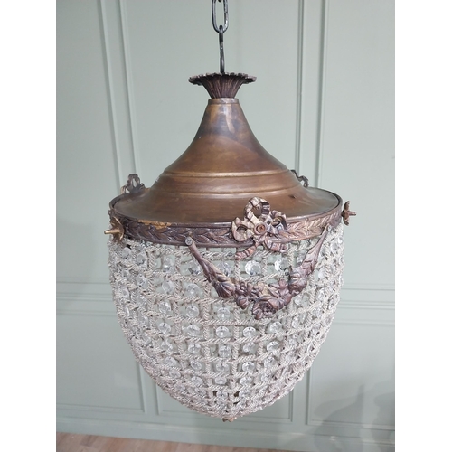 425 - French brass and cut crystal tear drop chandelier. {66 cm H x 33 cm Dia.}.