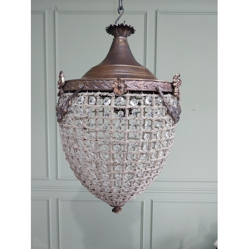 425 - French brass and cut crystal tear drop chandelier. {66 cm H x 33 cm Dia.}.