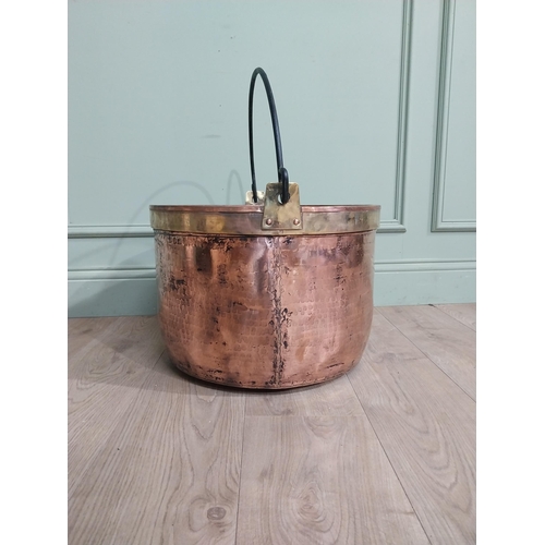 427 - 19th C. Copper and brass log bucket with wrought iron handle. {55 cm H x 52 cm Dia.}.