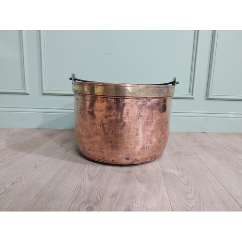 427 - 19th C. Copper and brass log bucket with wrought iron handle. {55 cm H x 52 cm Dia.}.