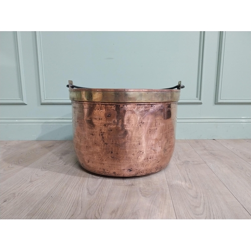 427 - 19th C. Copper and brass log bucket with wrought iron handle. {55 cm H x 52 cm Dia.}.