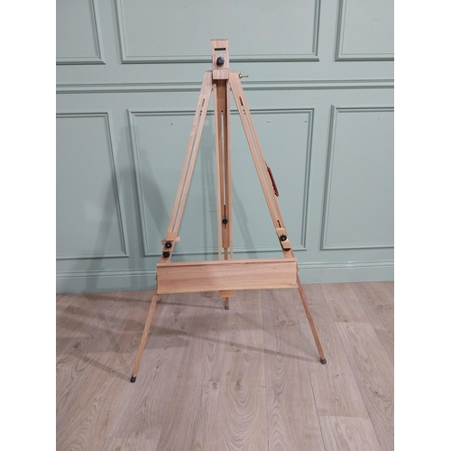 440 - Pine artist's easel. {133 cm H x 77 cm W x 43 cm D}.