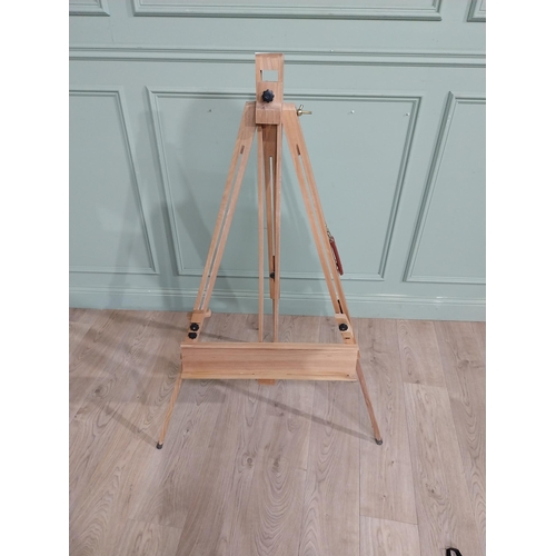 440 - Pine artist's easel. {133 cm H x 77 cm W x 43 cm D}.