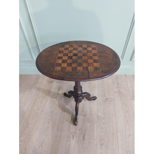 442 - 19th C. Burr walnut games table on turned column and three outswept feet. {69 cm H x 56 cm W x 44 cm... 