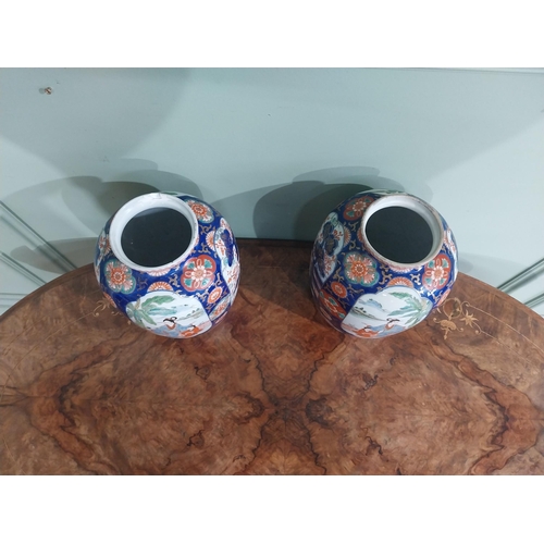 446 - Pair of Imari oriental vases. {24 cm H x 18 cm Dia.}