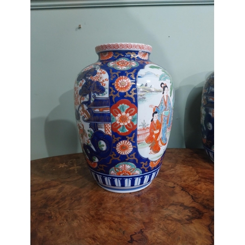 446 - Pair of Imari oriental vases. {24 cm H x 18 cm Dia.}