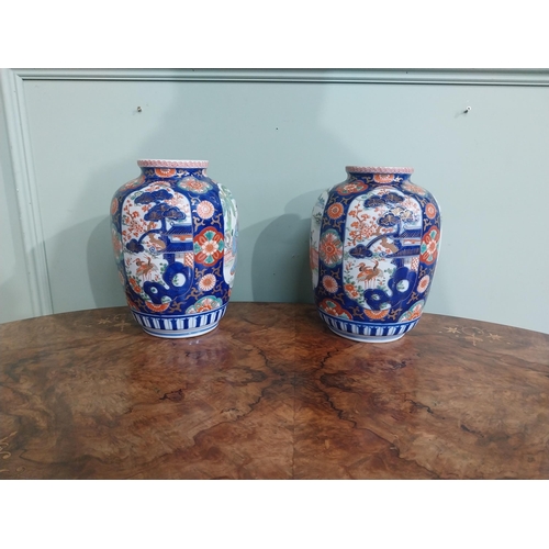 446 - Pair of Imari oriental vases. {24 cm H x 18 cm Dia.}