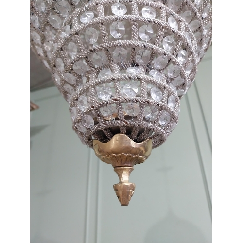 448 - French brass and cut crystal tear drop chandelier. {76 cm H x 36 cm Dia.}.