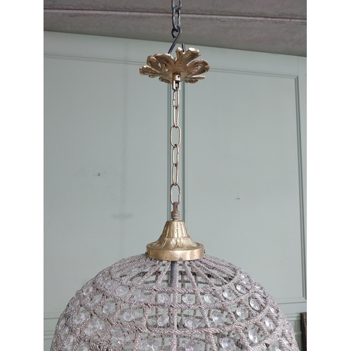 448 - French brass and cut crystal tear drop chandelier. {76 cm H x 36 cm Dia.}.