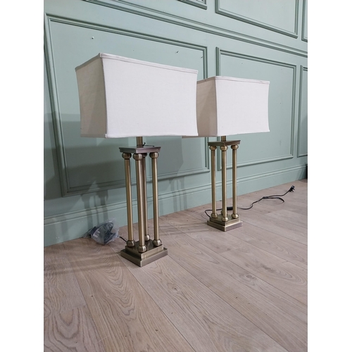 45 - Pair of good quality brushed brass table lamps with cloth shades. {81 cm H x 40 cm W x 23 cm D}.