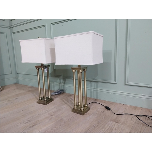 45 - Pair of good quality brushed brass table lamps with cloth shades. {81 cm H x 40 cm W x 23 cm D}.