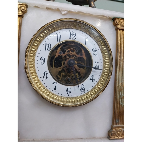 456 - 19th C French onyx mantle clock with gilded spelter mounts. {40 cm H x 23 cm W x 12 cm D}.