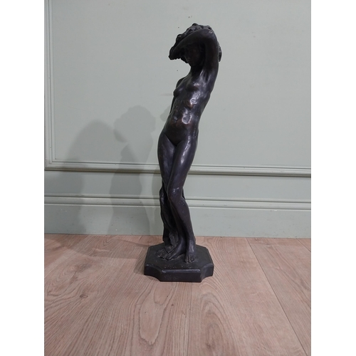 459 - Bronzed resin figure of a Lady. {64 cm H x 20 cm W x 20 cm D}.