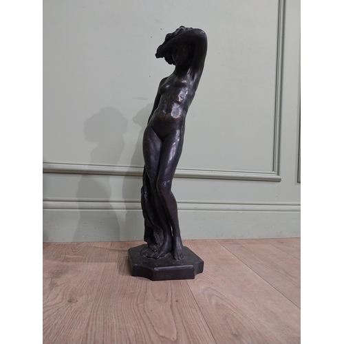 459 - Bronzed resin figure of a Lady. {64 cm H x 20 cm W x 20 cm D}.