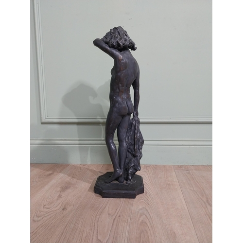 459 - Bronzed resin figure of a Lady. {64 cm H x 20 cm W x 20 cm D}.