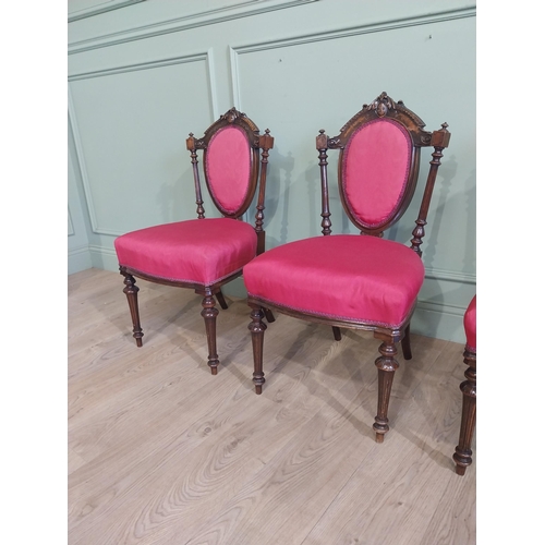 462 - Set of four 19th C. Walnut side chairs with carved back flanked by turned supports raised on tapered... 