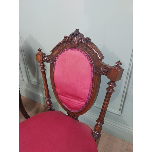 462 - Set of four 19th C. Walnut side chairs with carved back flanked by turned supports raised on tapered... 