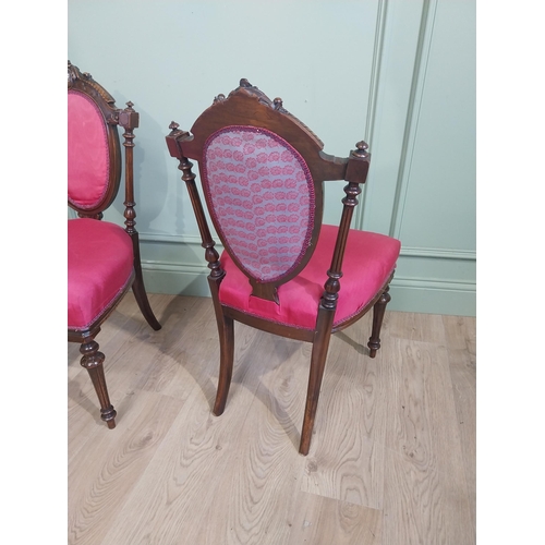 462 - Set of four 19th C. Walnut side chairs with carved back flanked by turned supports raised on tapered... 