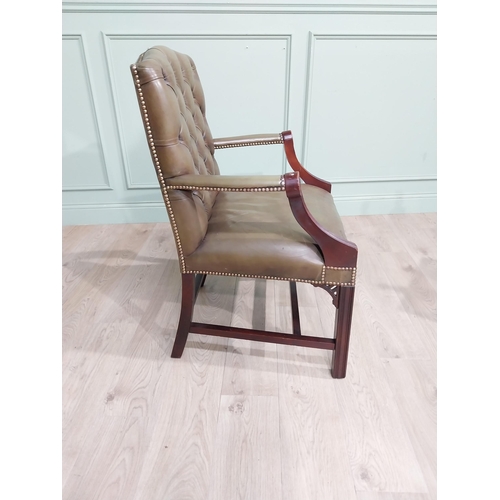 463 - Mahogany and leather upholstered Gainsborough armchair on square legs. {98 cm H x 66 cm W x 63 cm D}... 