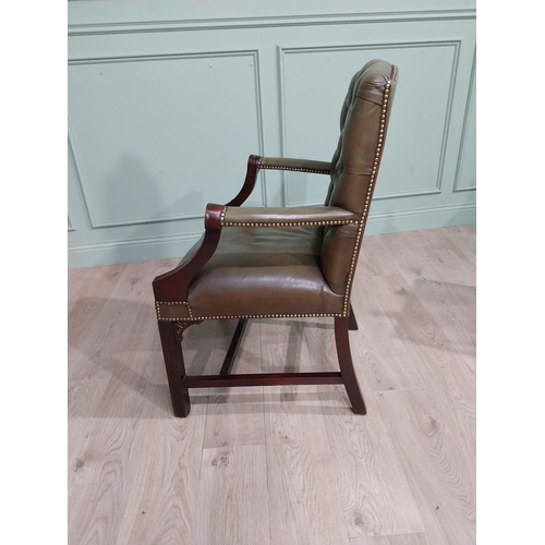 463 - Mahogany and leather upholstered Gainsborough armchair on square legs. {98 cm H x 66 cm W x 63 cm D}... 