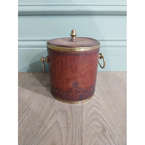 464 - Vintage leather and brass ice bucket. {20 cm H x 19 cm Dia.}.