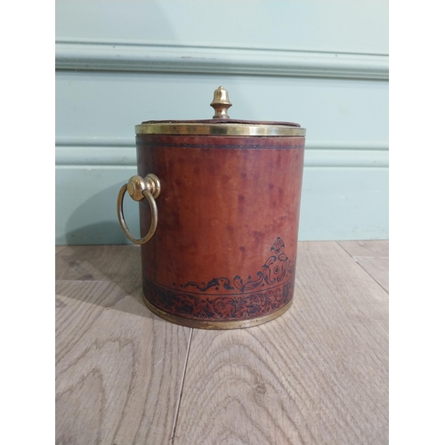 464 - Vintage leather and brass ice bucket. {20 cm H x 19 cm Dia.}.