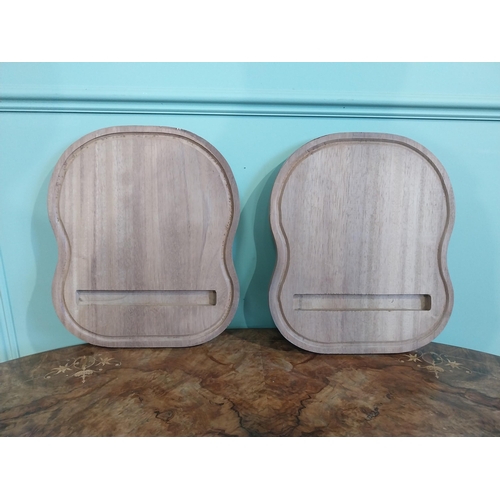 468 - Two mahogany chopping boards. {30 cm H x 35 cm W}.