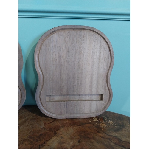 468 - Two mahogany chopping boards. {30 cm H x 35 cm W}.