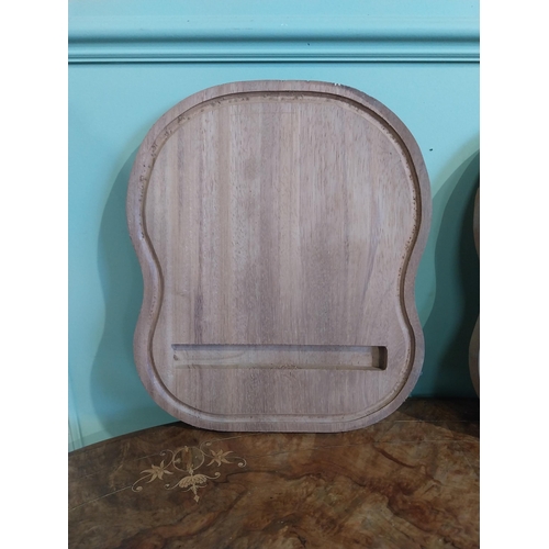 468 - Two mahogany chopping boards. {30 cm H x 35 cm W}.