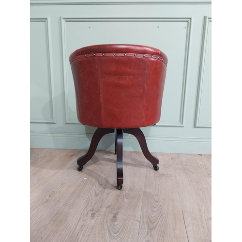 47 - Edwardian mahogany and leather swivel office chair. {74 cm H x 57 cm W x 55 cm D}.