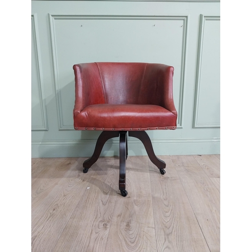 47 - Edwardian mahogany and leather swivel office chair. {74 cm H x 57 cm W x 55 cm D}.