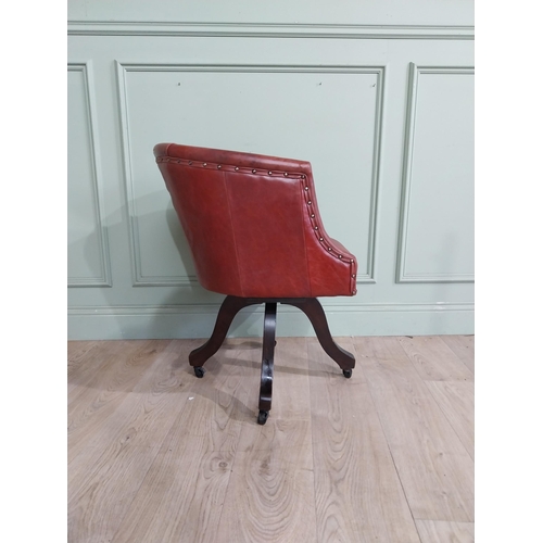 47 - Edwardian mahogany and leather swivel office chair. {74 cm H x 57 cm W x 55 cm D}.