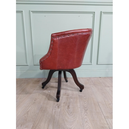 47 - Edwardian mahogany and leather swivel office chair. {74 cm H x 57 cm W x 55 cm D}.