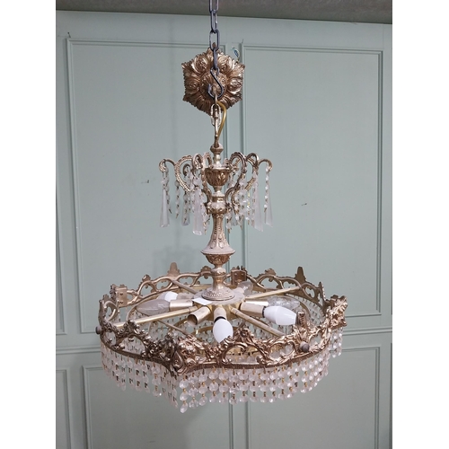 474 - 1950�s French brass and crystal drop chandelier. {70 cm H x 52 cm Dia.}.