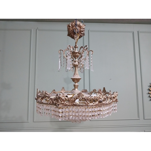 474 - 1950�s French brass and crystal drop chandelier. {70 cm H x 52 cm Dia.}.