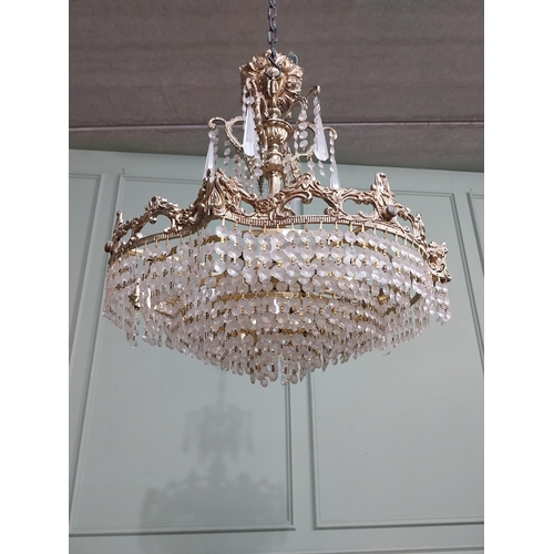 474 - 1950�s French brass and crystal drop chandelier. {70 cm H x 52 cm Dia.}.