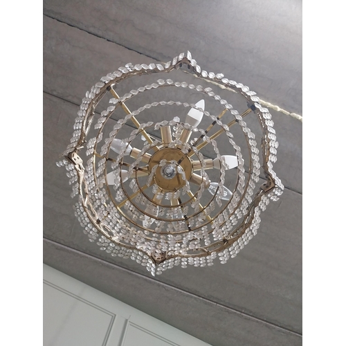 474 - 1950�s French brass and crystal drop chandelier. {70 cm H x 52 cm Dia.}.