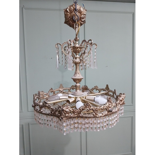 474 - 1950�s French brass and crystal drop chandelier. {70 cm H x 52 cm Dia.}.