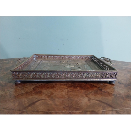 476 - Edwardian embossed brass Punch and Judy serving tray. {5 cm H x 36 cm W x 23 cm D}.